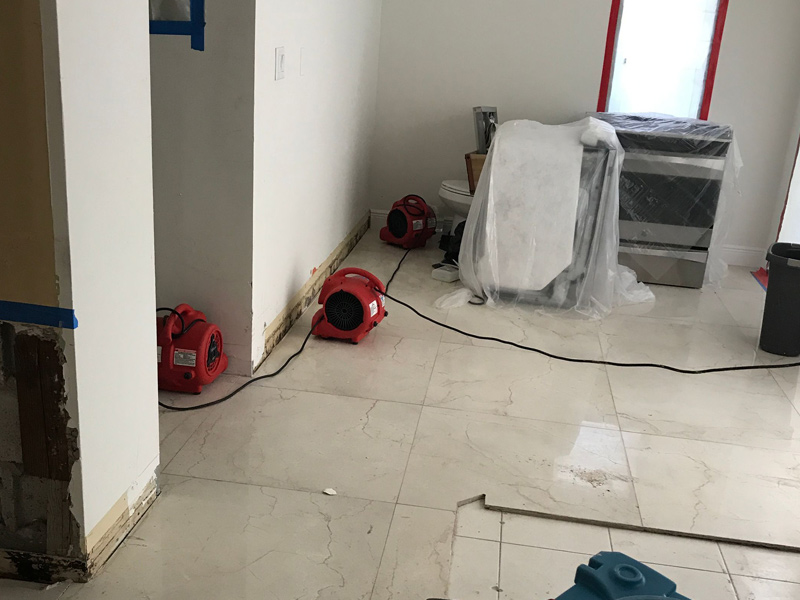 Our technicians dry out a house in Coral Gables from water damage.